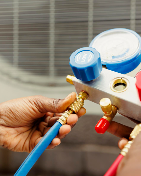 Technician servicing a unit